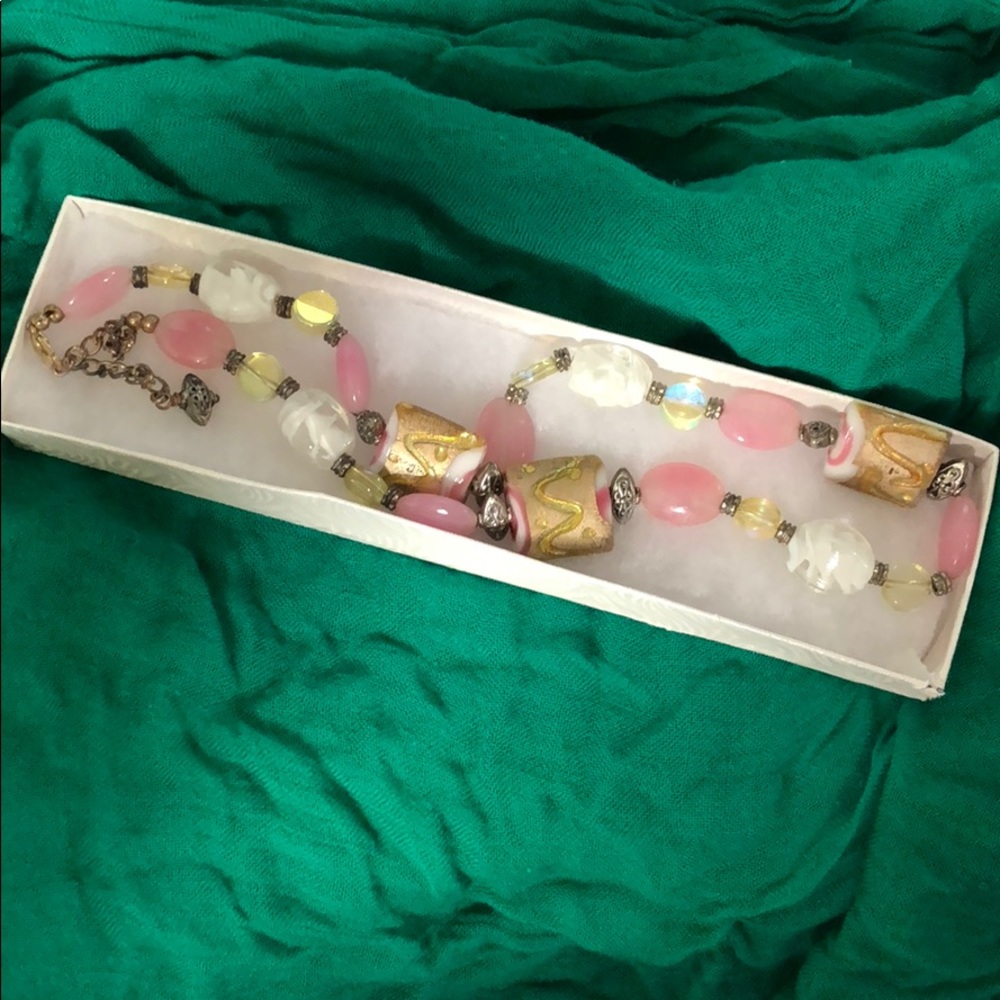 Handmade beaded necklace with matching earrings